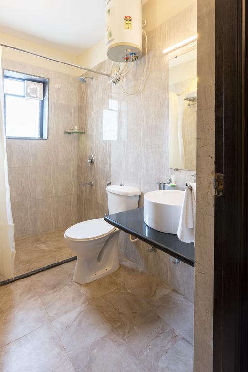 Treebo Trend Zeebo Suites Arpora Buitenkant foto
